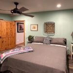bed in upstairs bedroom of the barndo