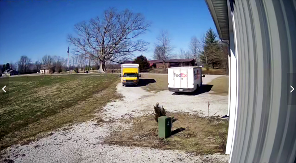 two delivery trucks fight for unload time